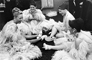 Feathery: Four ballroom dancers relaxing, Blackpool