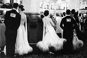 Ballroom dancers standing waiting