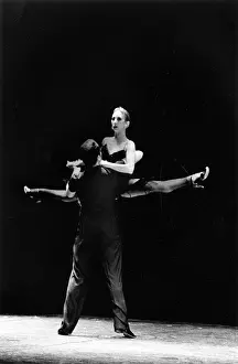 Splits: Ballroom dancing couple in action