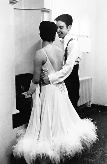 Feathery: Ballroom dancing couple in dressing room