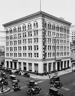 Intersecting: Bank on corner of busy intersection