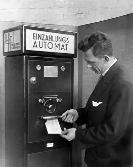 Client: Bank deposit machine, 1931