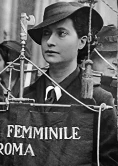 Gruppo: Banner bearer at a parade in Rome, 1936