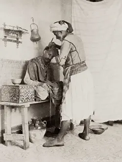 Washboard: Barber cutting hair, Algeria
