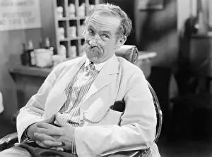 Worries: Barber sitting on a chair waiting