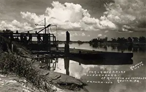 Racks: Barges on the bank of the Panuco River, Mexico