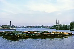 Newsprint: Barges on the River Thames at Woolwich, SE London
