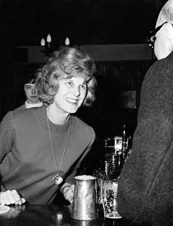 Frothy: BARMAID GRINS & BEARS IT