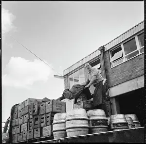 Mcmullens: Barrels and crates of beer on the back of a delivery