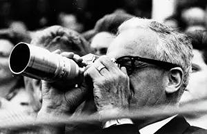 Goldwater: Barry Goldwater looking through a binocular