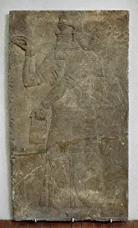 Assyrian: Bas relief Assyrian Genie. 9th century BC. Archeological Mus