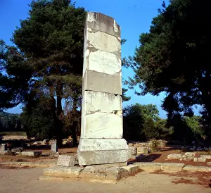Itself: The base or pillar of the Nike of Paionios