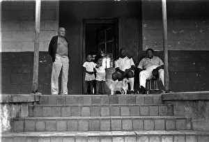 Verandas: Basil Nunn visiting with the greens in the old John