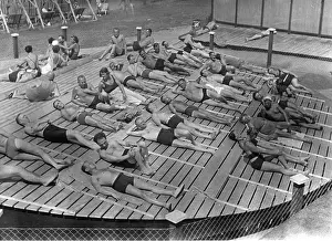 Evenly: Bathers in a lido of Vienna