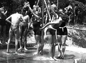 Showering: Some bathers are taking a shower