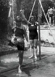 Showering: Some bathers are taking a shower