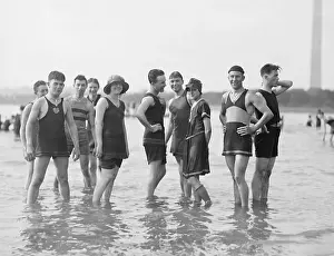 Bsloc1608: Bathing fashions in the 1910s. Men were required