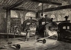 Steelworks: A battery of rolling mills producing steel rail