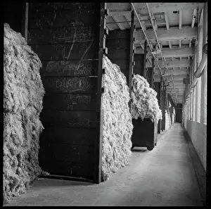 Shipley: Bay stacked with raw wool awaiting processing in Salt's Mill