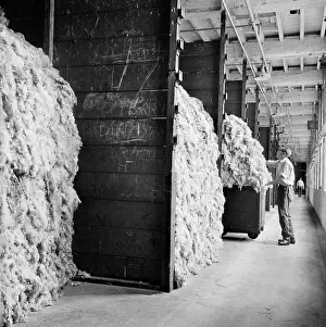 Shipley: Bay stacked with raw wool awaiting processing in Salt's Mill