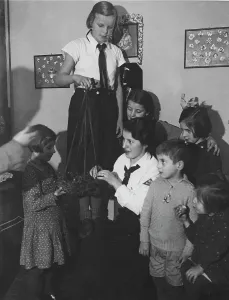 Advent: BDM at child care, 1935