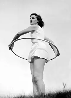 Hoop: BDM girl doing gymnastics, 1940