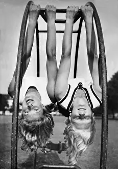 BDM girls exercise on a gym wheel