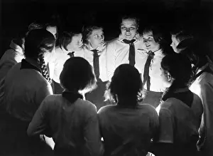 Campfire: BDM girls at night around the campfire, 1933