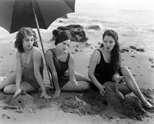 Sandcastle: Beach beauties making sand castles