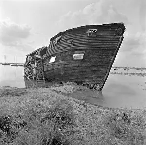 Propped: Beached Houseboat