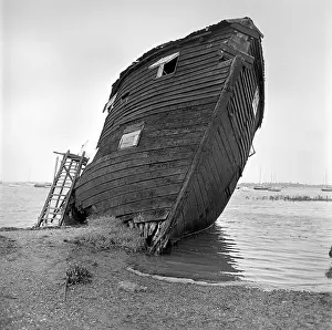 Propped: Beached Houseboat