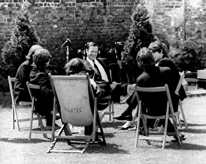 Epstein: The Beatles and manager Brian Epstein taking a break