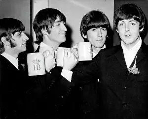 Mugs: The Beatles with mugs held upside down