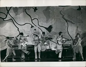 Hello: The Beatles performing with dancing girls