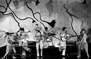 Hello: The Beatles performing with dancing girls