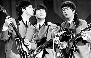 Guitars: The Beatles performing in the USA