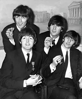 Ringo: The Beatles pop group with their MBEs