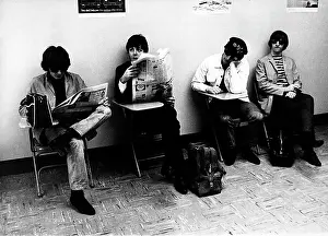 Dozing: The Beatles sitting in a waiting room