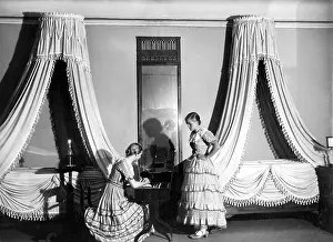 Furnishings: Bedroom with canopy beds