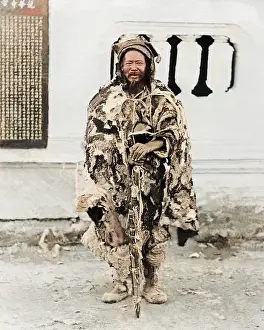Ragged: Beggar in ragged clothes, China