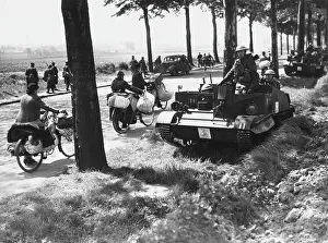 Bren: Belgian refugees passing troops WWII
