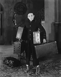 Overload: Bell Boy with luggage