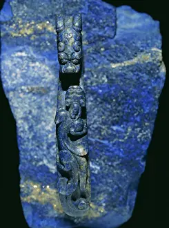 Calcium: Belt-hook in lapis lazuli