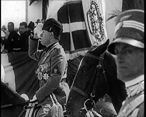 Reviewing: Benito Mussolini in Ceremonial Uniform On Horseback