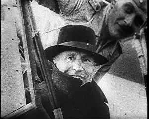 Benito Mussolini and a German Soldier in a Plane