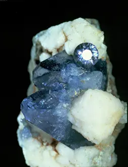 Cyclosilicate: Benitoite crystal and cut stone