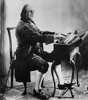 Graduated: Benjamin Franklin with a glass harmonica