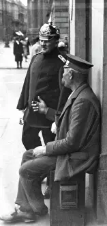 Weekday: Berlin policeman and porter, 1913