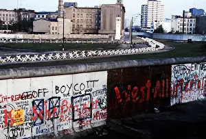 Righ: The Berlin Wall separated Communist-controlled ?