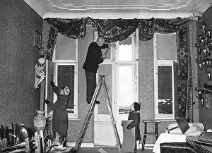 Cardboard: Berliners board up their windows damaged by bombs, 1943